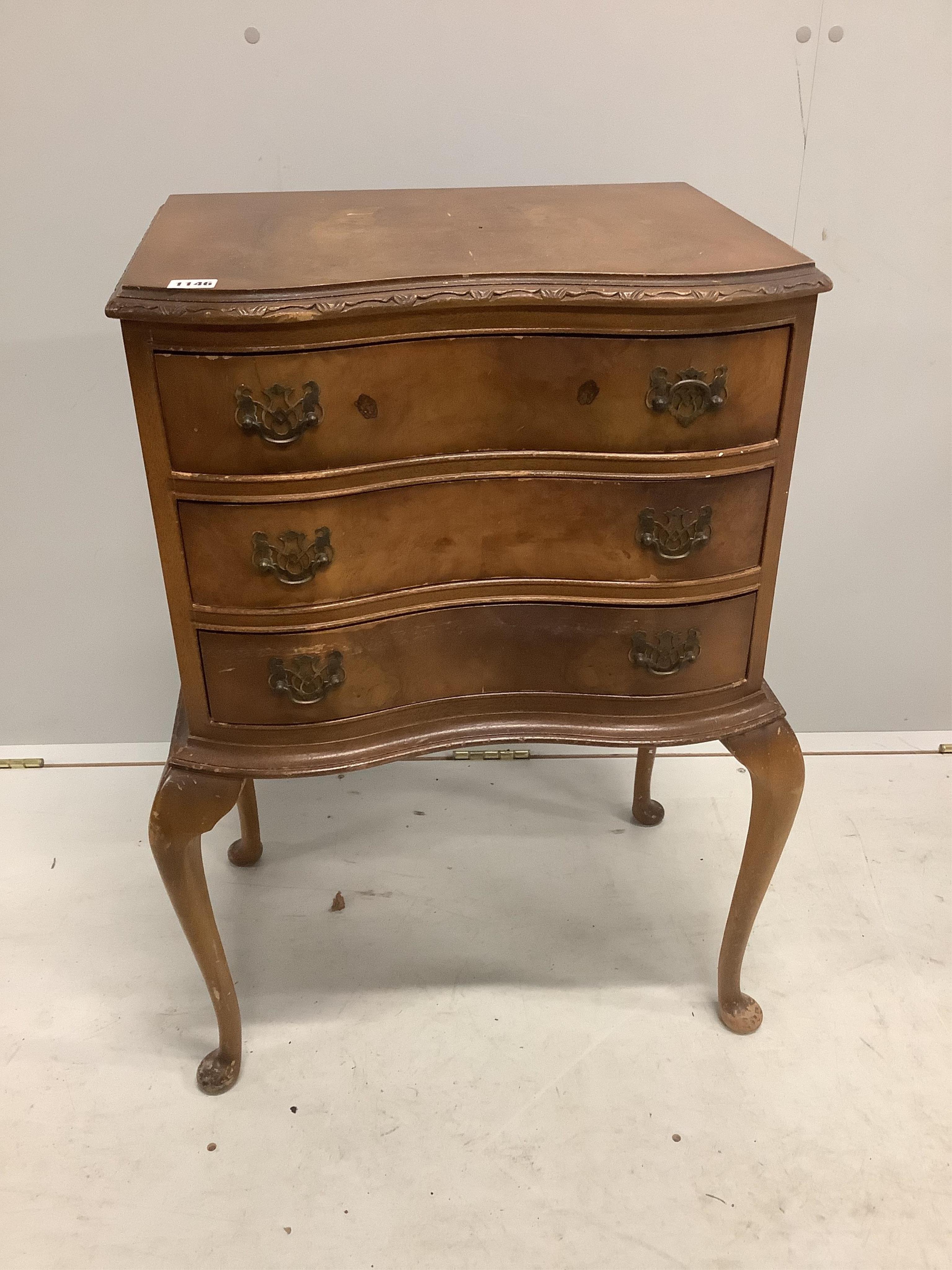 A pair of Queen Anne Revival serpentine walnut three drawer bedside chests, width 51cm, depth 35cm, height 77cm. Condition - poor to fair